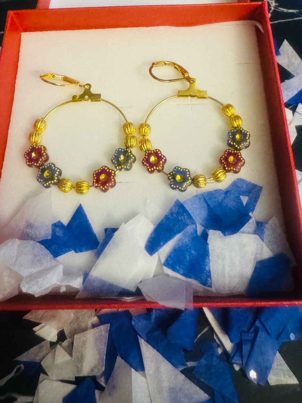 Gold Hoop Earrings with Red and Blue Flower Charms